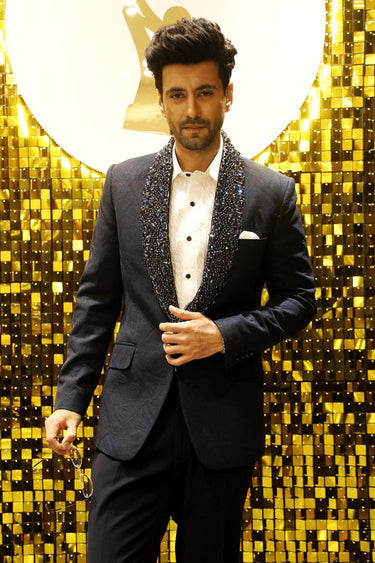 KARANVIR SHARMA in Our blue blazer with stone embellishment on the collar - Bharat Reshma