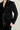 Black double-breasted tux with subtle silver stripes