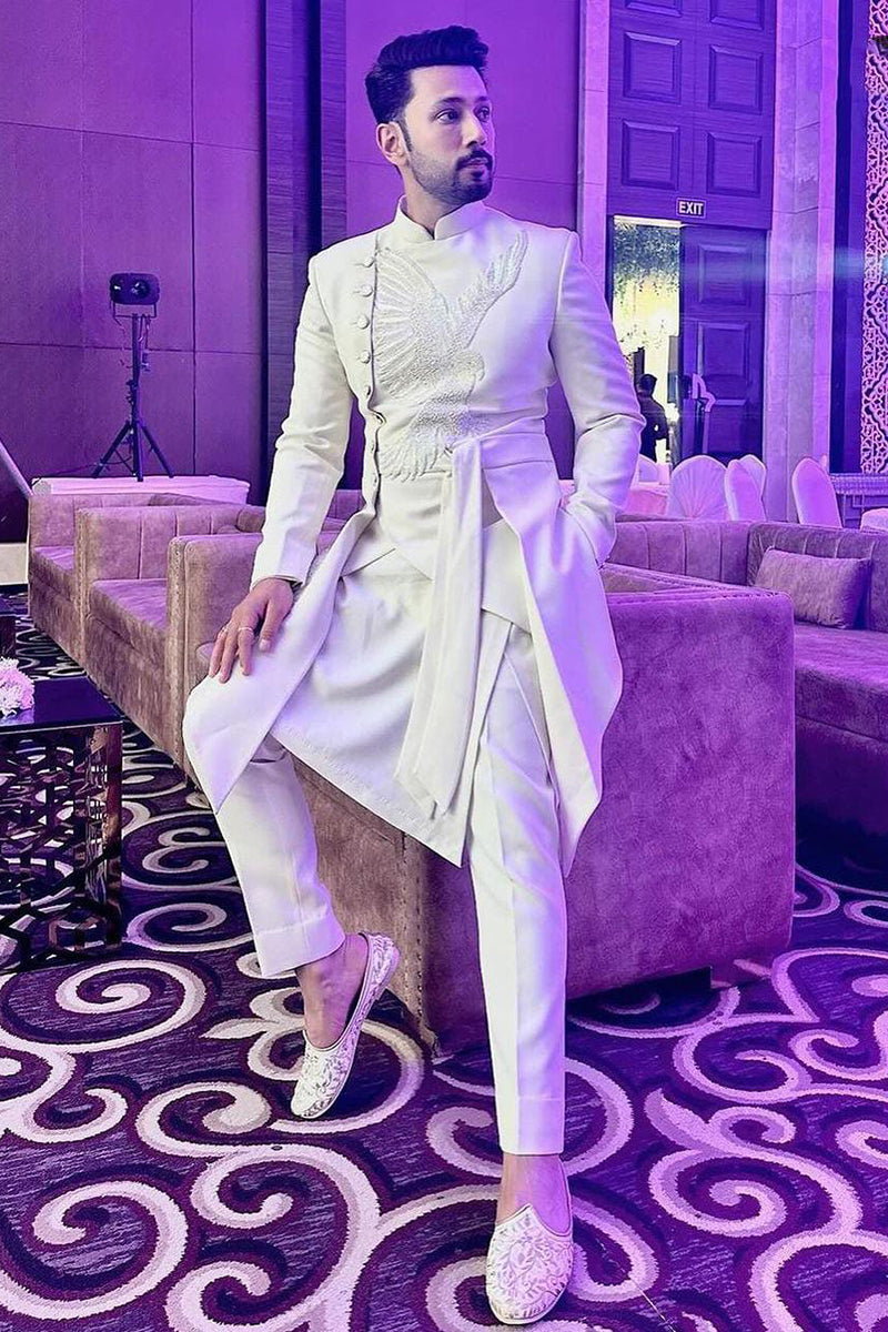 Sahil Anand in White indo western jacket decorated with an eagle pattern