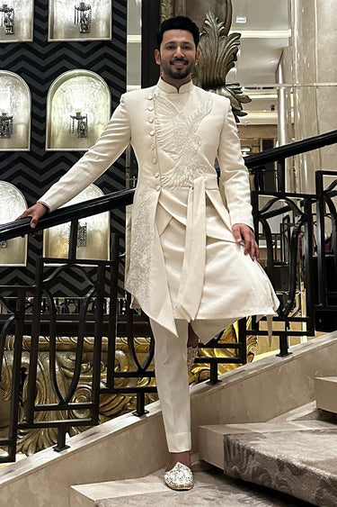 Sahil Anand in White indo western jacket decorated with an eagle pattern - Bharat Reshma